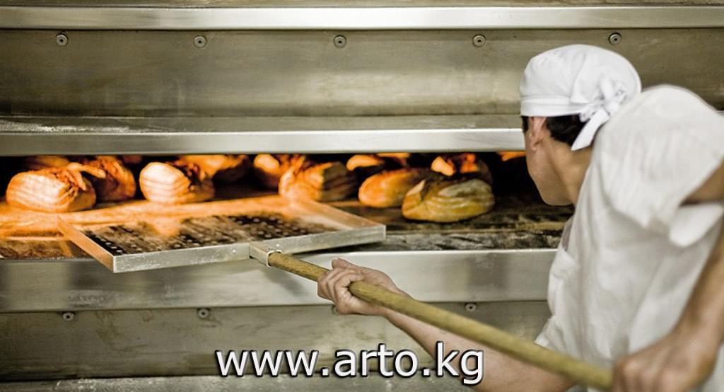 Выпечка хлеба в пекарне Выпечка хлеба в пекарне
